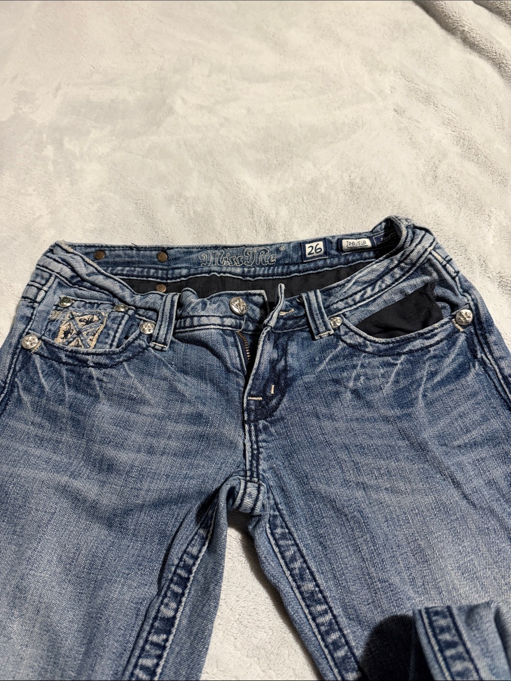 Miss Me Light Wash Blue Distressed Mid-Rise Jeans